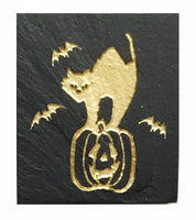 Textured black slate magnet with inscribed cat on pumpkin