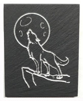 Textured black slate magnet with howling wolf inscribed