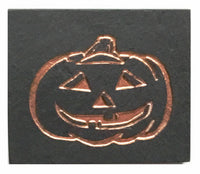 Textured black slate magnet with inscribed jack o' lantern