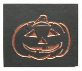Textured black slate magnet with inscribed jack o' lantern