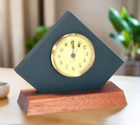 Black slate Moosehead clock with gold face on mahogany base