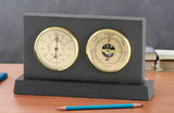 Natural cleft Black slate 2-hole Rangeley weather station with thermometer and barometer with gold faces on a black slate base