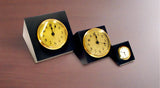 Three black slate Sebago pyramidal desk clocks one large, one medium, one small; Large and medium with gold faces, small with white face