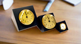 Three Sebago clocks in black, three different sizes