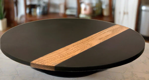 Honed black slate lazy susan with a wide wood inlay
